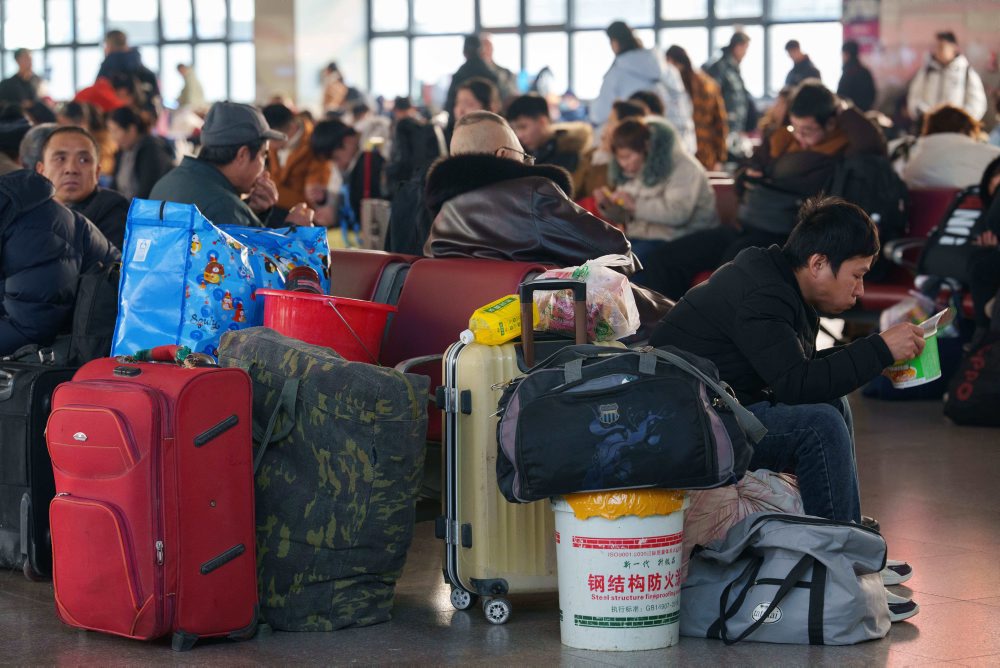 Číňania sa vracajú domov pred blížiacimi sa oslavami čínskeho lunárneho Nového roka